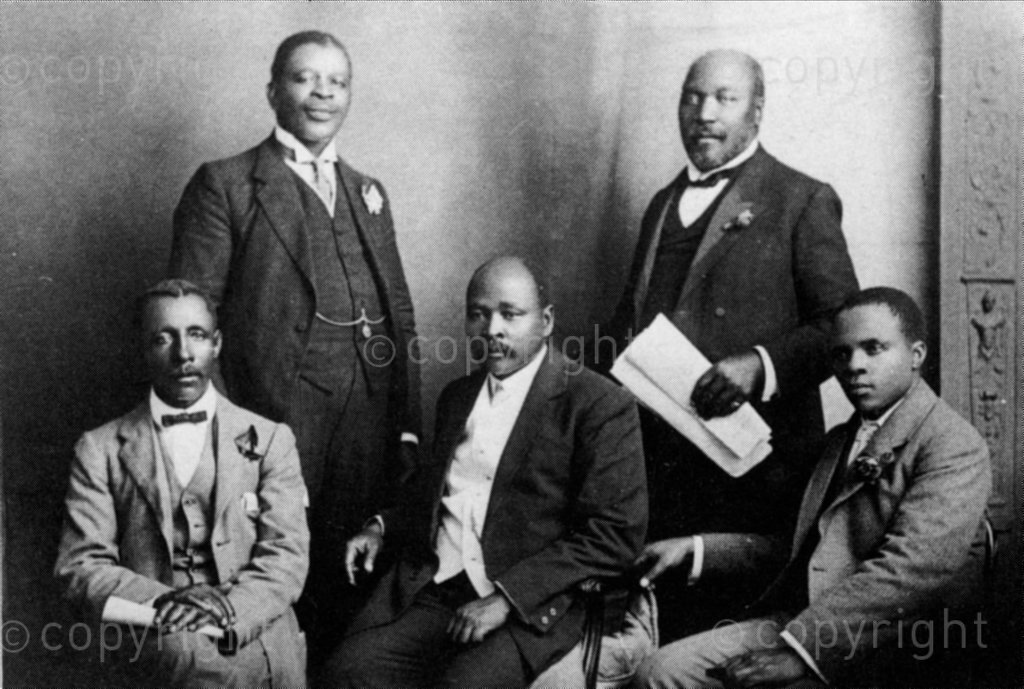 DM2002040705:SA:POLITICS:1914 - African National Congress - After the 1913 Land Act, the ANC began to look to the outside world for allies. The South African Native National Congress delegation to England, June 1914. Left to right: Thomas Mapike, Rev Walter Rubusana, Rev John Dube, Saul Msane, Sol Plaatjie. The delegation tried to get the British Government to intervene against the Land Act but the outbreak of the First World War thwarted their hopes. (Photographer unknown © Unknown)