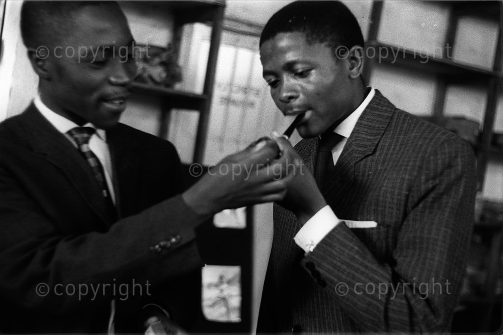 DM2001092006:GCP:POLITICS:PERSONALITY:18MAY1969 - Another Sobukwe Man Freed, Banned - Another former Pan Africanist Congress leader, Mr Selby T. Ngendane (left), has been restricted and gagged by the Government. Mr Ngendane, Minister for foreign affairs in Sobukwe's 'cabinet' was discharged from Robben Island, where he was serving a 6 and a half-year term, on April 25. With him is his secretary in Sobukwe's cabinet, Mr John Mahapa who were arrested, released and gagged with him. 
Photograph by Post photographer / BAHA / african.pictures