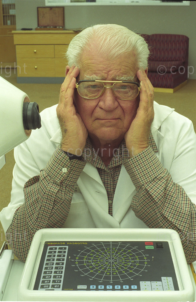 DG0017, South Africa, circa 1999: Optometrist, Bernard Woolf of Cape Town. Woolf designed and developed a visual testing instrument which he called the Woolf Scotoma Scanner - which was never put to use. Until The Optoscan derived from the Scotoma, battery operated Optascan was widely used, particularly in rural clinics for detecting retinal defects.

Photograph: David Goldblatt/South Photographs