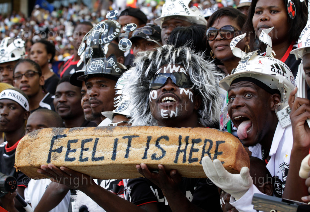 Orlando Pirates soccer fans watch as their side take on Kaizer Chiefs at the Moses Mabhida Stadium in Durban, March 25, 2010. © Rogan Ward 2010
