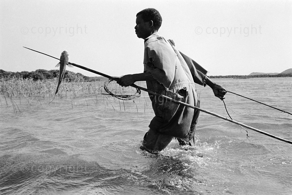 Fisherman and his catch at Kosi Bay, part of the Greater St Lucia Wetland Park and UNESCO World Heritage Site
