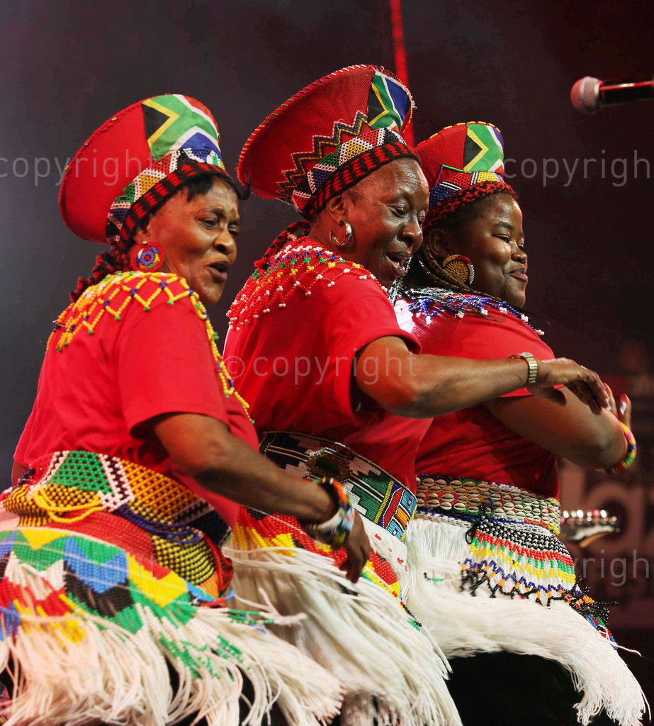 March 27, 2015. Mahotella Queens from left - Nobesuthu Mbadu, Hilda Tloubatla and Amanda Nkosi perform on stage during the 16th Cape Town International Jazz Festival. PHOTOGRAPH: ESA ALEXANDER. Â© SUNDAY TIMES/ TIMES MEDIA
