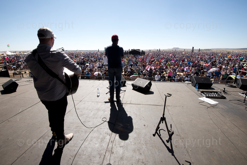 1.7 million people signed up to attend the national day of prayer marketed as IT'S TIME. Held on former South African Springbok Rugby player, Ollie Le Roux's farm 4 km North of Bloemfontein, roads to the venue from all directions were at a standstill by 6 am for the meeting that was due to start at 12 noon. Significantly Buchan led the crowd in a prayer of repentance for racism and negativity about South Africa and prayed for release for those gripped by fear. Together South Africans of all colours prayed for an end to violence, rape, murder, adultery and other evils and for a God-fearing government to rise in the nation.