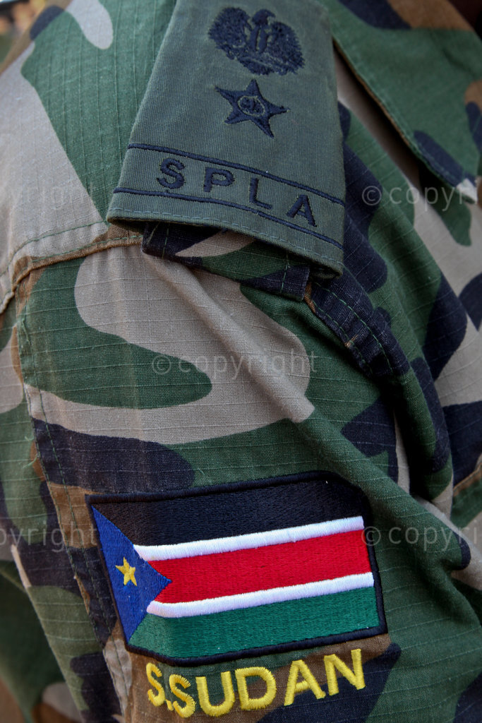 The rank insignia and flag on the uniform of a Lietenant Colonel in the South Sudan Army. (21 September 2017)