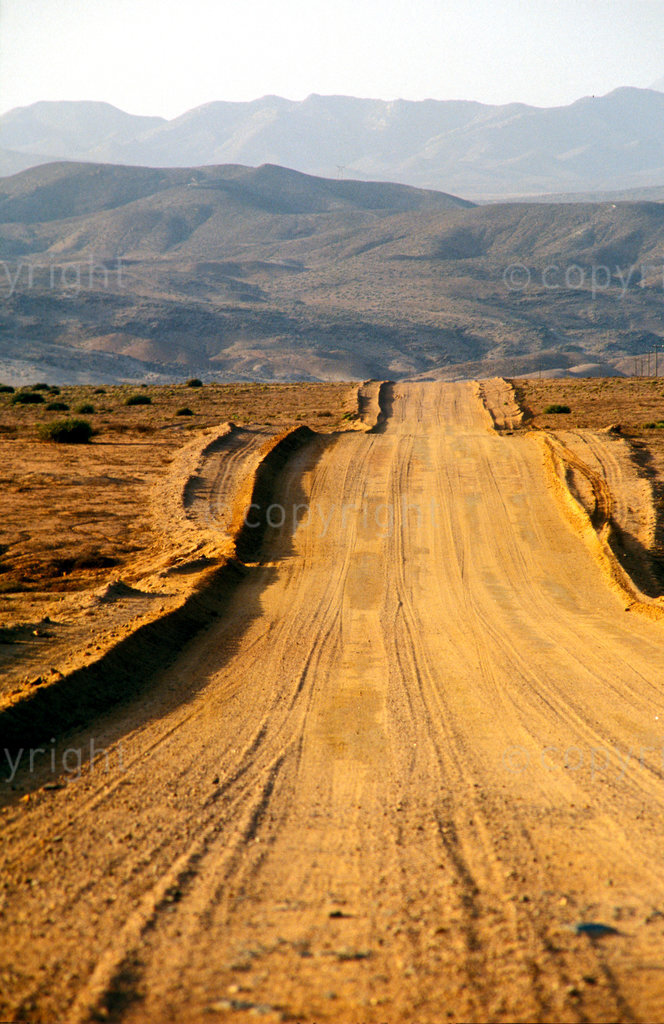 PW085, South Africa, Northern Cape. Dusty road in the arid landscape of Richtersveld. Desert Wilderness Barren landscape

Photograph: Paul Weinberg/South