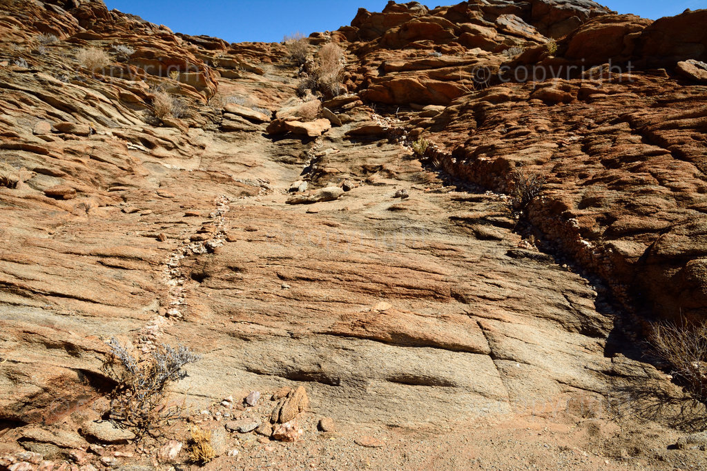 Pegmatite intrusion through older sandstone layers near Ramansdrift, Namaqualand 4x4 Trail,  Northern Cape Province, South Africa.