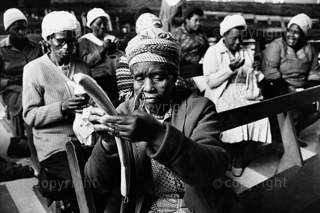 September 12, 1979. Women making covered coat hangers at Itekeng, a women's sewing project, based at Moroka Methodist Church. Photo by Peter Magubane. Â© Rand Daily Mail/Times Media
