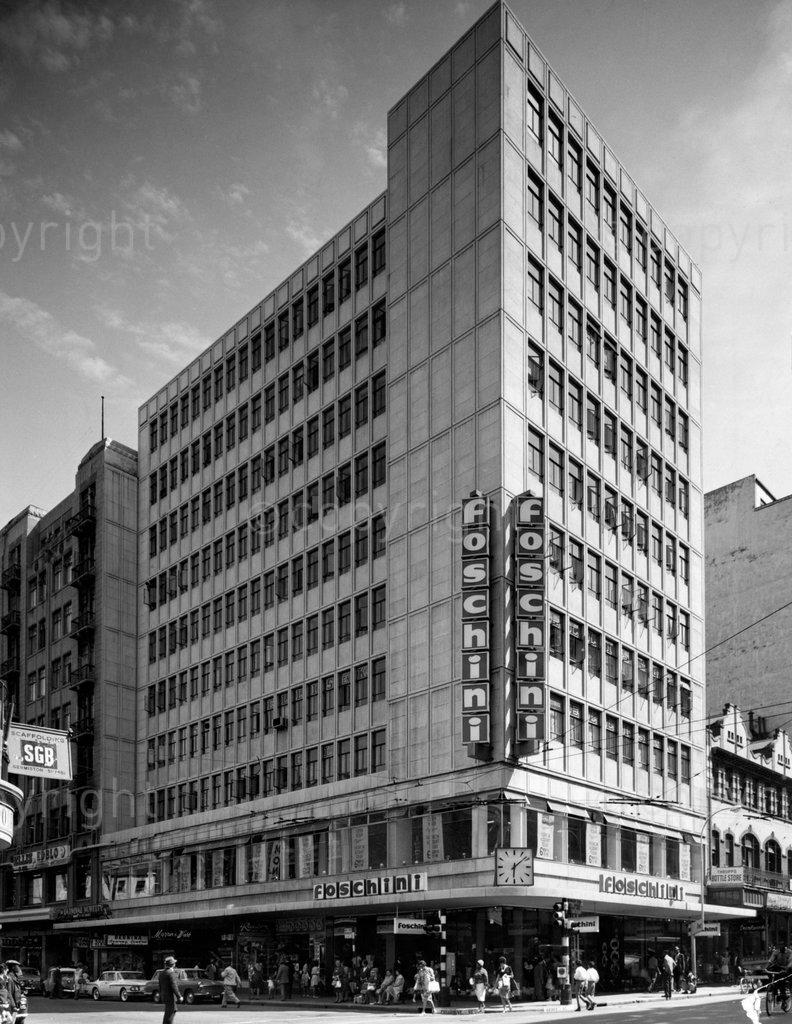September 1964. Franwell House, 105 President Street, corner Eloff Street, Johannesburg with Foschini clothing on the corner. The building was sold to a syndicate and family trust for R1,115,000. Photographer unknown. Â© Sunday Times/Times Media