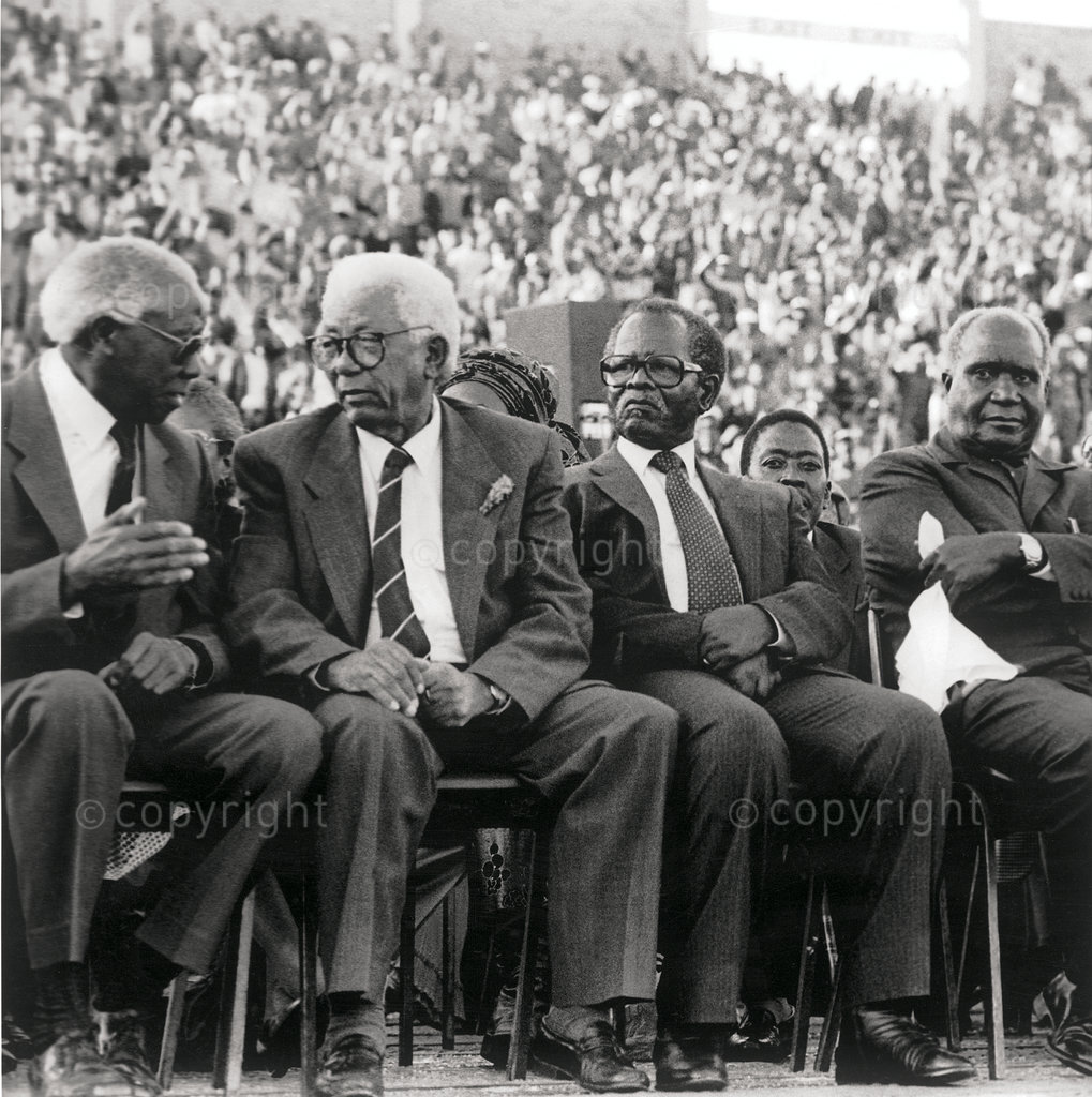 Oliver Tambo (second from right) is flanked by other ANC stalwarts at the funeral of activist Chris Hani, who was murdered by Janusz Walus outside his home in 1993. To the left of Tambo are Walter Sisulu and Govan Mbeki, and on his right is former Zambian president Kenneth Kuanda
