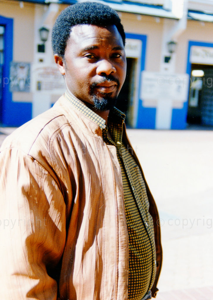 Colour photo of actor Thomas Mogotlane; stills from unedited interviews with South African (and some American) writers, journalists and activists made in the late 80s and 90s about censorship and films; In Darkest Hollywood - Cinema and Apartheid, Part 1 and 2; South Africa; 1990