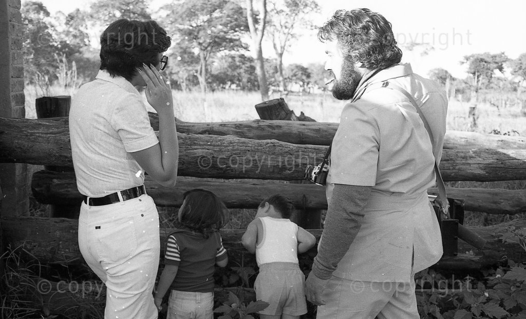 Black and white photo of farm owners and their children at a cattle farm in Rhodesia; Rhodesian Civil War documentary about the conflict between Ian Smith's white minority government and the black nationalists of the ZANU and ZAPU movements; Rhodesia; Zimbabwe; 1976