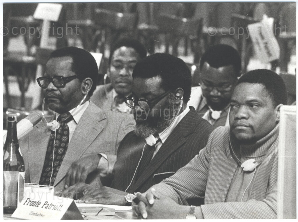 City Hall, Reggio Emilia, Italy, 19770627. PHOTO: ANC Archives.
A group photograph of representatives from southern Africa (left to right), President of the African National Congress (ANC), Oliver Tambo, President of the South West African People’s Organisation (SWAPO), Samuel Daniel Shafiishuna Nujoma and Zimbabwean politician Kumbirai Kangai, on the occasion of the signing of the