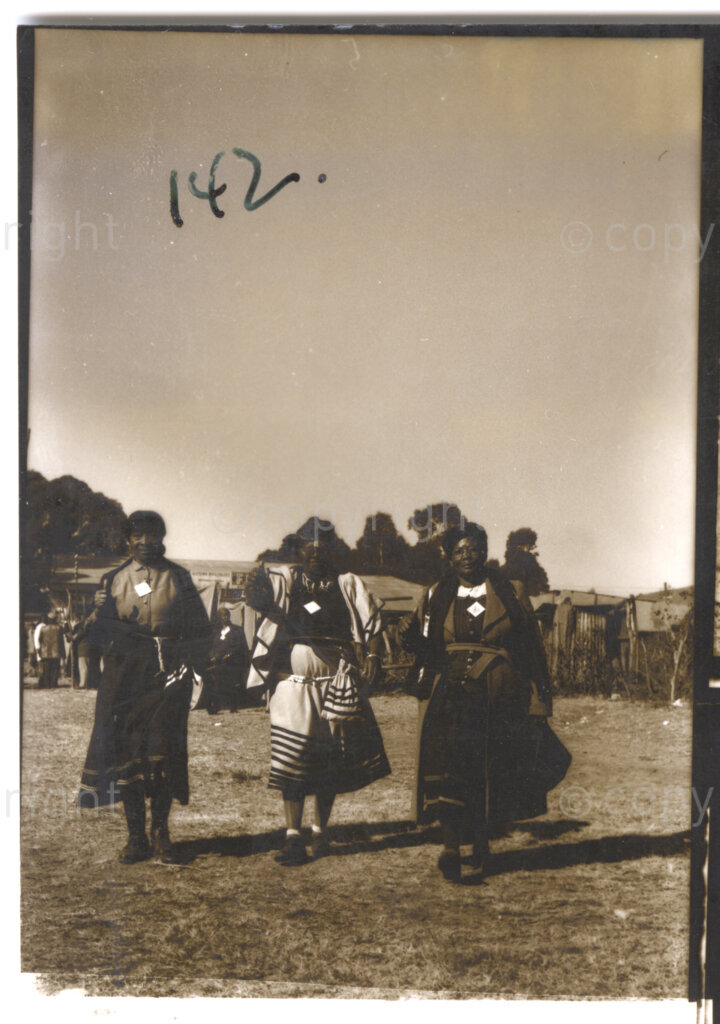 Kliptown, Johannesburg, Transvaal (now Gauteng), South Africa, 19550625. PHOTO: Eli Weinberg.

Three women walk towards the camera making the thumbs up salute. They are delegates attending the Congress of the People held in Kliptown, Johannesburg on June 25 and 26 1955. The Freedom Charter was adopted at this Congress.