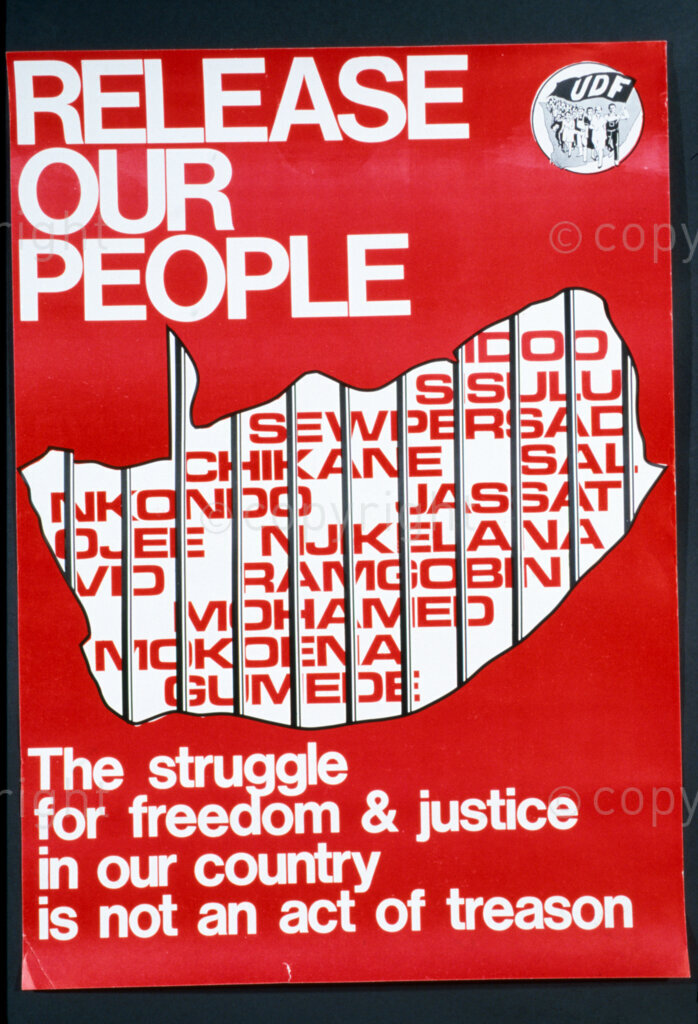 South Africa, Date Unknown. PHOTO: ANC Archives.

The formation of United Democratic Front (UDF) in 1983 revived the spirit of political activism amongst the Black communities. UDF became an umbrella body to different political formations. It used posters to communicate messages to its meetings.  Poster: UDF: RELEASE OUR PEOPLE. The struggle for freedom & justice in our country is not an act of treason.