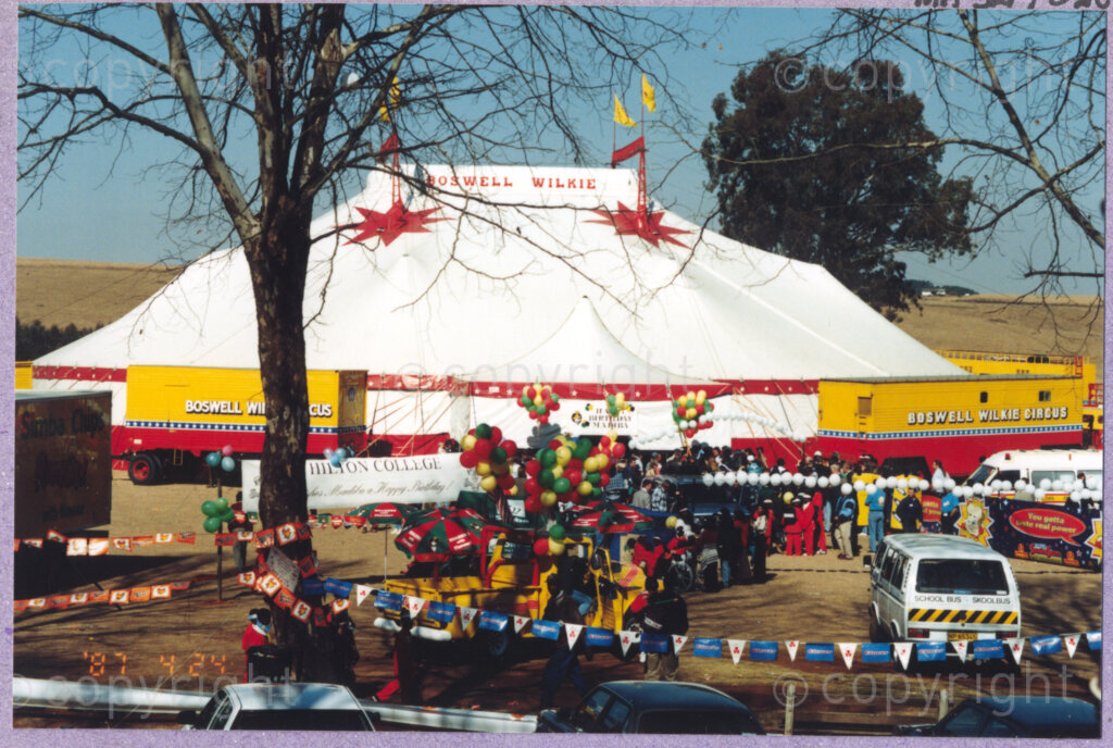 Hilton College, Pietermaritzburg, KwaZulu-Natal, South Africa, 19960717. PHOTO: ANC Archives.

The circus tent is adorned with balloons at the 78th birthday celebration of the President of South Africa, Nelson Mandela, fondly known as Madiba. More than 2,000 children who are living with disability in disadvantaged communities across the county have been invited to the day-long birthday extravaganza being held on the 17th July 1996 on the grounds of Hilton College near Pietermaritzburg in the KwaZulu-Natal Midlands. The children, their carers, Madiba and other guests are being entertained playing games, enjoying party fare, and attending a circus performance in a big top (a first-time experience for Madiba who has, to date, never been to a circus!). The event has the backing of the Nelson Mandela Children's Fund.