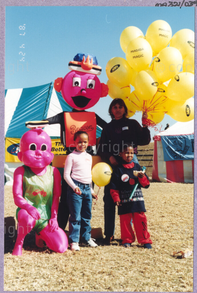 Hilton College, Pietermaritzburg, KwaZulu-Natal, South Africa, 19960717. PHOTO: ANC Archives.

Children stand with costumed characters at the 78th birthday celebration of the President of South Africa, Nelson Mandela. More than 2,000 children who are living with disability in disadvantaged communities across the county have been invited to the day-long birthday extravaganza being held on the 17th July 1996 on the grounds of Hilton College near Pietermaritzburg in the KwaZulu-Natal Midlands. The children, their carers, Madiba and other guests are being entertained playing games, enjoying party fare, and attending a circus performance in a big top (a first-time experience for Madiba who has, to date, never been to a circus!). The event has the backing of the Nelson Mandela Children's Fund.