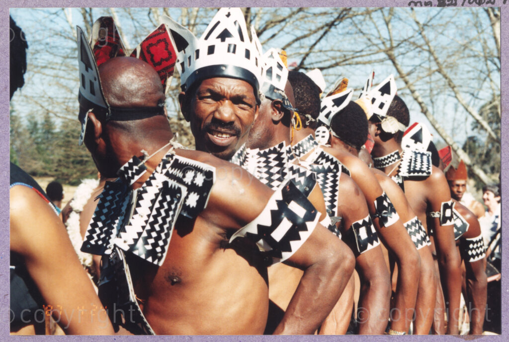 Hilton College, Pietermaritzburg, KwaZulu-Natal, South Africa, 19960717. PHOTO: ANC Archives.

The cast of uMabatha, the Zulu Macbeth, escort Nelson Mandela to meet his guests at his 78th birthday celebration. The birthday extravaganza is being held on the 17th July 1996 on the grounds of Hilton College near Pietermaritzburg in the KwaZulu-Natal Midlands. More than 2,000 children who are living with disability in disadvantaged communities from across the county have been invited to the event which has the backing of the Nelson Mandela Children's Fund.