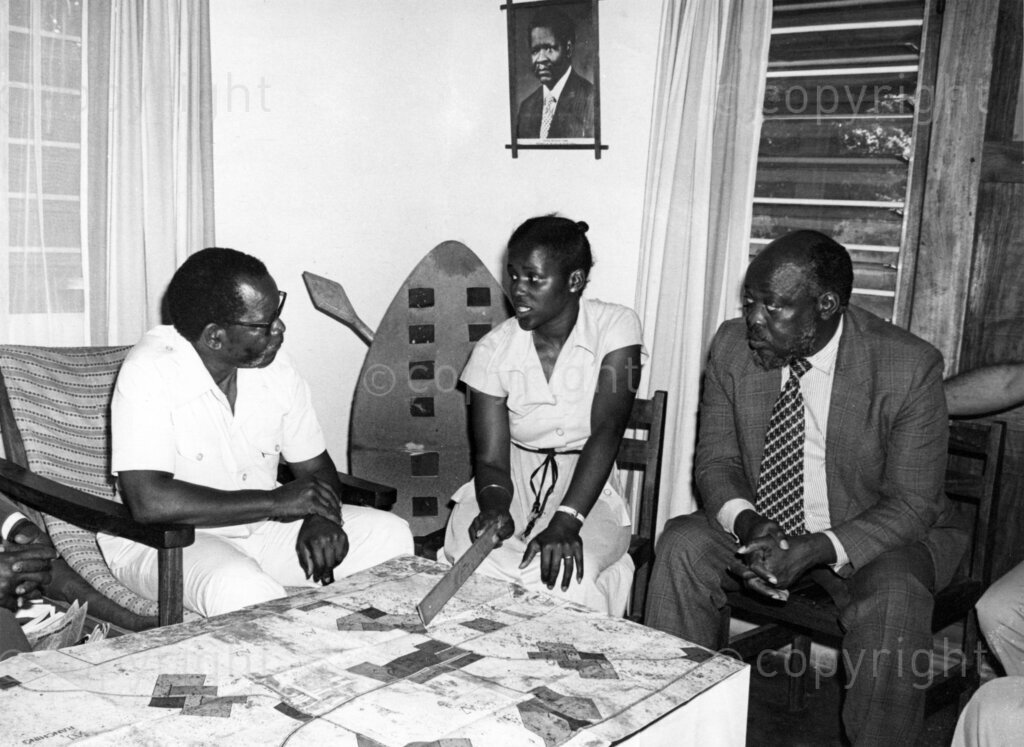 Dakawa, Morogoro, Tanzania, Late 1970’s - 1980’s. PHOTO: ANC Archives.

Mary Ngozi (centre) takes Oliver Tambo (left) and Andrew Masondo (right) through development plans at Dakawa, Tanzania in the late 1980's. Andrew Masondo was the National Commissar of the ANC at the time.