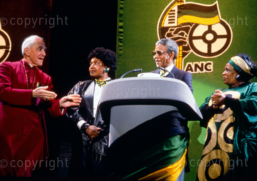 London, United Kingdom, Early 1990s. PHOTO: ANC Archives.

From left to right: Reverend Trevor Huddleston, Winnie Mandela, Nelson Mandela and Adelaide Tambo. Reverend Trevor Huddleston is one of the internationalists who spoke openly about the life of Black people and their living conditions under apartheid government. He is a receiver of the the Isitwalandwe, which is the highest award the African National Congress (ANC) gives to courageous men and women who championed the cause of the oppressed people of South Africa.
