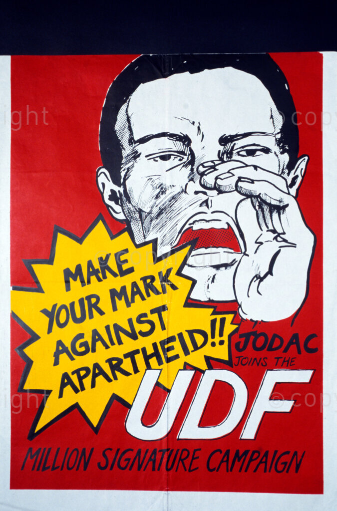 South Africa, Date Unknown. PHOTO: ANC Archives

The formation of UDF in South Africa revitalised and conscientised the Black people about their political rights. UDF became an umbrella body to many formations and it adopted the Freedom Charter as its policy document.  Johannesburg Democratic Action Committee (JODAC).   Poster:  MAKE YOUR MARK AGAINST APARTHEID; JODAC JOINS THE UDF MILLION SIGNATURE CAMPAIGN.