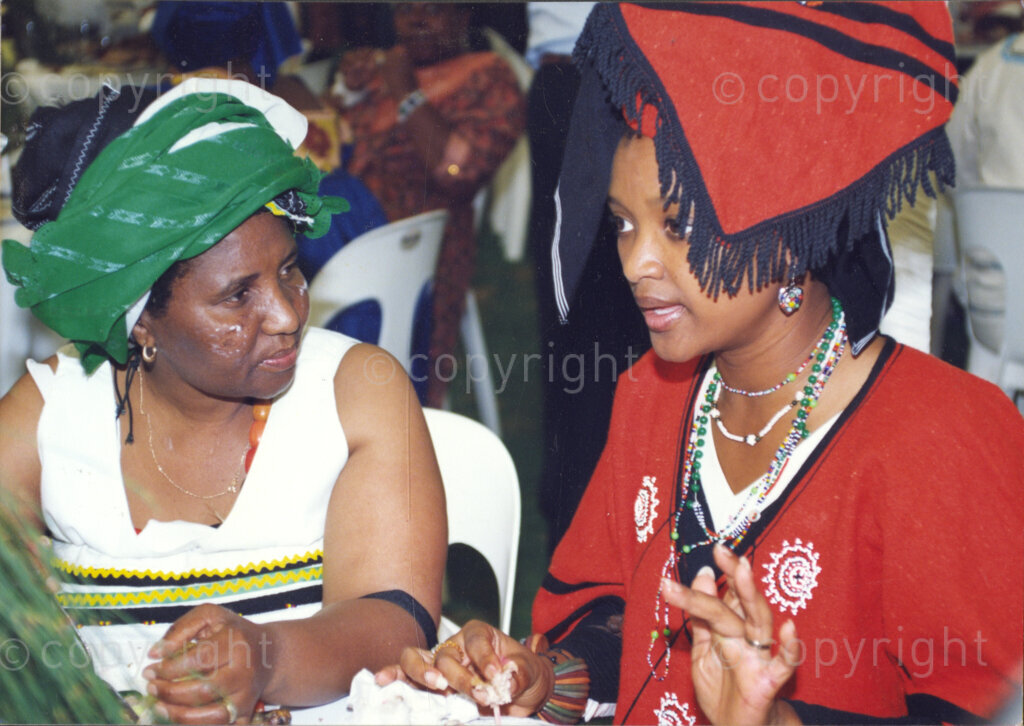 Cape Town, Western Cape, South Africa, 19970418. PHOTO: ANC Archives.

Two women in traditional Xhosa dress at the inauguration of the National Council of Traditional Leaders, Cape Town, Western Cape, South Africa on 18 April 1997.