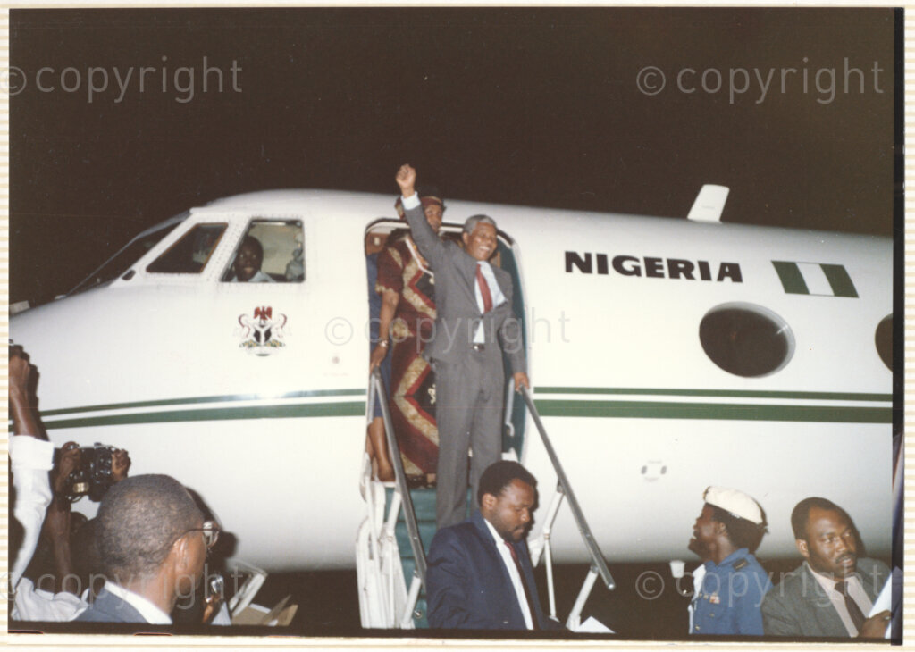 Nigeria, 19900513. PHOTO: ANC Archives.

Nelson Mandela visits Nigeria 13-16 May 1990. He visited several African countries shortly after his release from prison in February 1990. He is accompanied by his wife, Winnie Mandela.