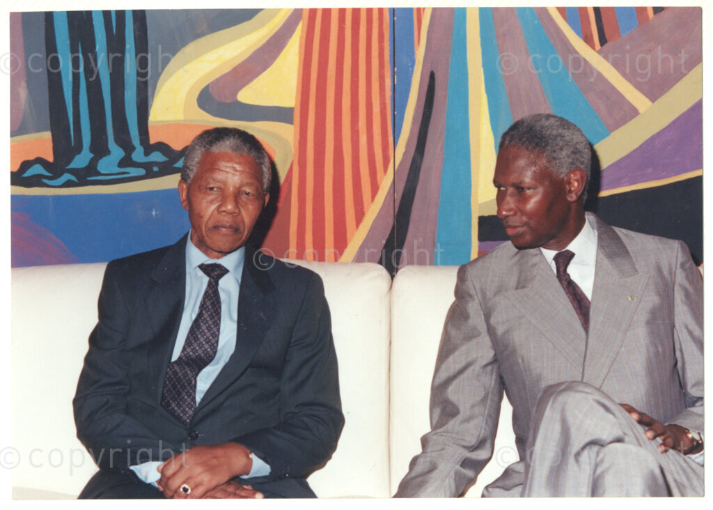 Senegal  , 19920601. PHOTO: ANC Archives.

Nelson Mandela (Left) is seated next to the Senegalese President, Abdou Diouf (Right) ) on his official visit to Senegal in June 1992.