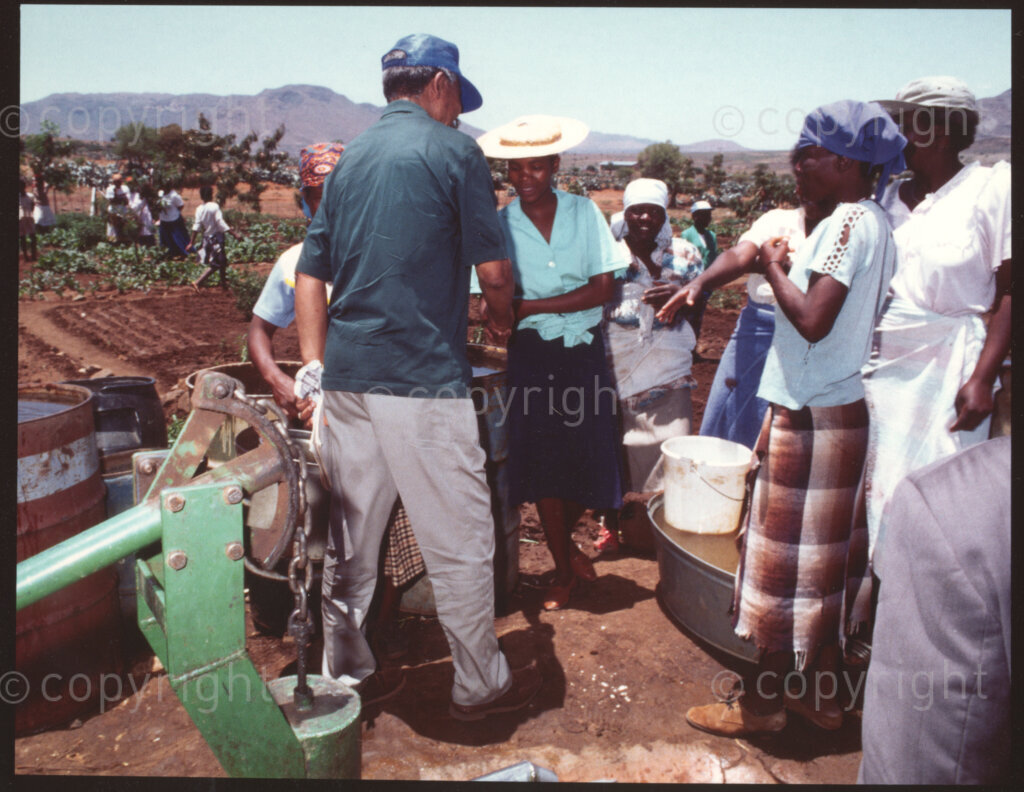 Maila Mapitsane village, Sekhukhuneland, Transvaal, South Africa, 19921130. PHOTO: ANC Archives.

The President of the African National Congress, Nelson Mandela (left) greets women at Makua Garden in the village of Maila Mapitsane in the Sekhukhuneland region in November 1992.