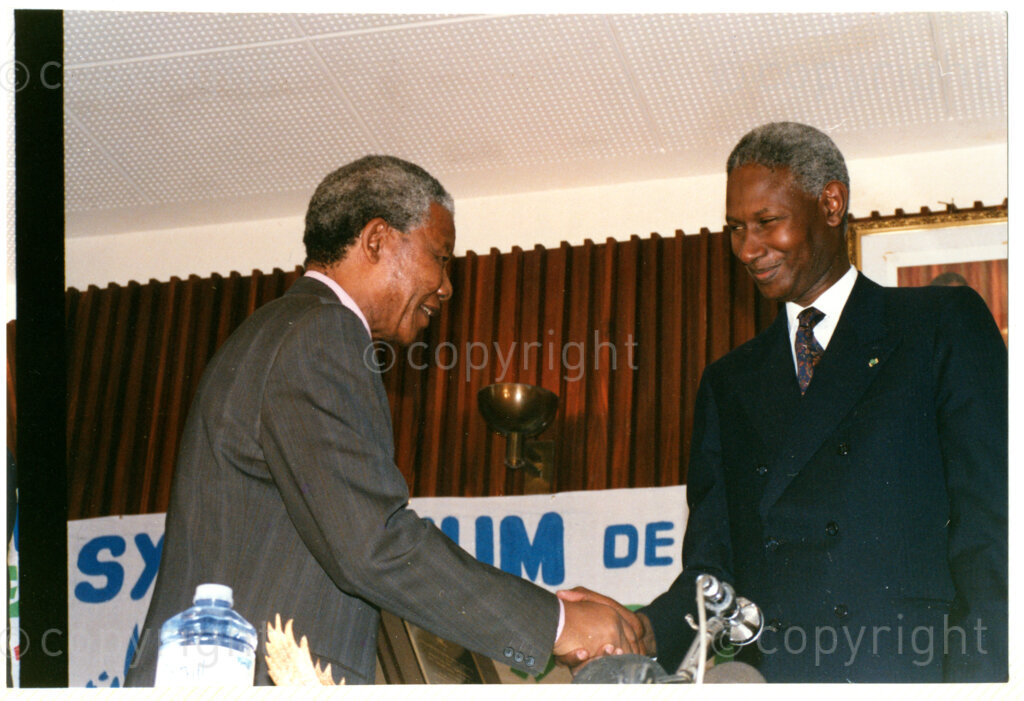 Senegal, 19920601. PHOTO: ANC Archives.

Senegalese President, Abdou Diouf (right), greets Nelson Mandela (left) during Mandela's visit to Senegal in June 1992, possibly at the Twenty-Eighth Assembly of Heads of States and Government of the Organisation of African Unity (OAU) in Dakar.
