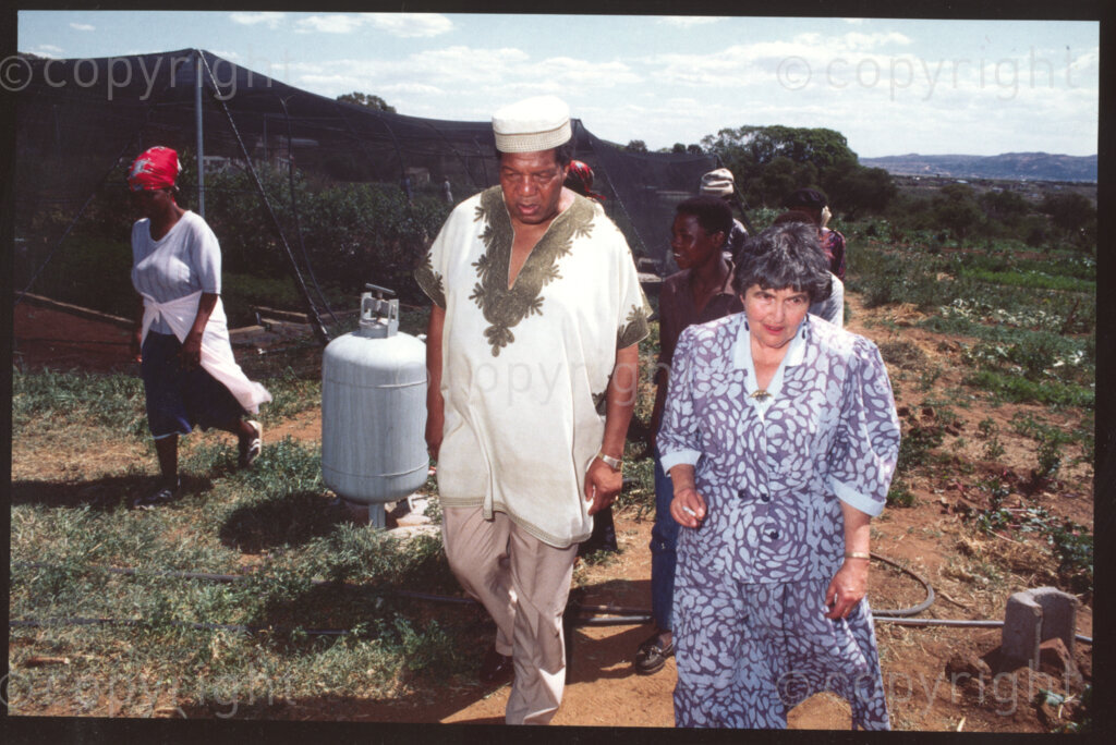 Jane Furse Agricultural Centre, Jane Furse town, Sekhukhuneland, Transvaal, South Africa, 19921130. PHOTO: ANC Archives.

The Chairman of Operational Hunger, Michael Rantho (left), and the Executive Director of Operation Hunger, Ina Perlman (right) visit the seedling nursery at Jane Furse Agricultural Center in Sekhukhuneland in November 1992.