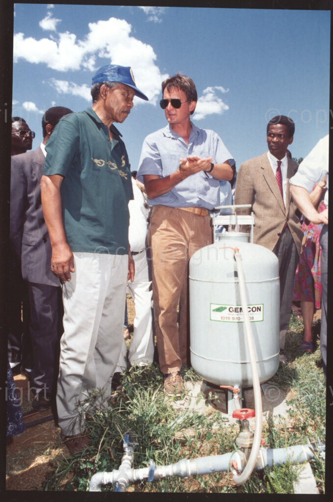 Jane Furse Agricultural Centre, Jane Furse , Sekhukhuneland, Transvaal, South Africa, 19921130. PHOTO: ANC Archives.

Operation Hunger Regional Director (for the Northern Transvaal), Johann Rissik (centre) demonstrates an automatic fertilizer tank to the President of the African National Congress (ANC), Nelson Mandela (left) at the seedling nursery, Jane Furse Agricultural Centre, Sekhukhuneland in November 1992.