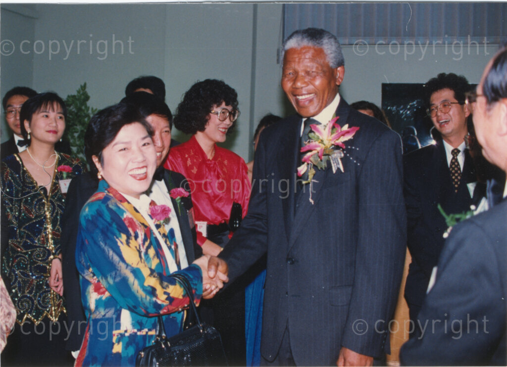 Parktonian Hotel, Johannesburg, Transvaal, South Africa, 19940309. PHOTO: ANC Archives.

The President of the African National Congress (ANC), Nelson Mandela (right) shakes hands with a Taiwanese official at an ANC voter education fund-raising dinner hosted by the Taiwanese community in South Africa on the 9 March 1994. Leading up to the 1994 elections in South Africa, Taiwan embarked on a public relations campaign in efforts to improve relations with the ANC, providing financial support to the ANC's election campaign. South Africa's diplomatic ties with Taiwan (The Republic of China) ended in 1998 however when Nelson Mandela, as President of South Africa, recognized the People's Republic of China.