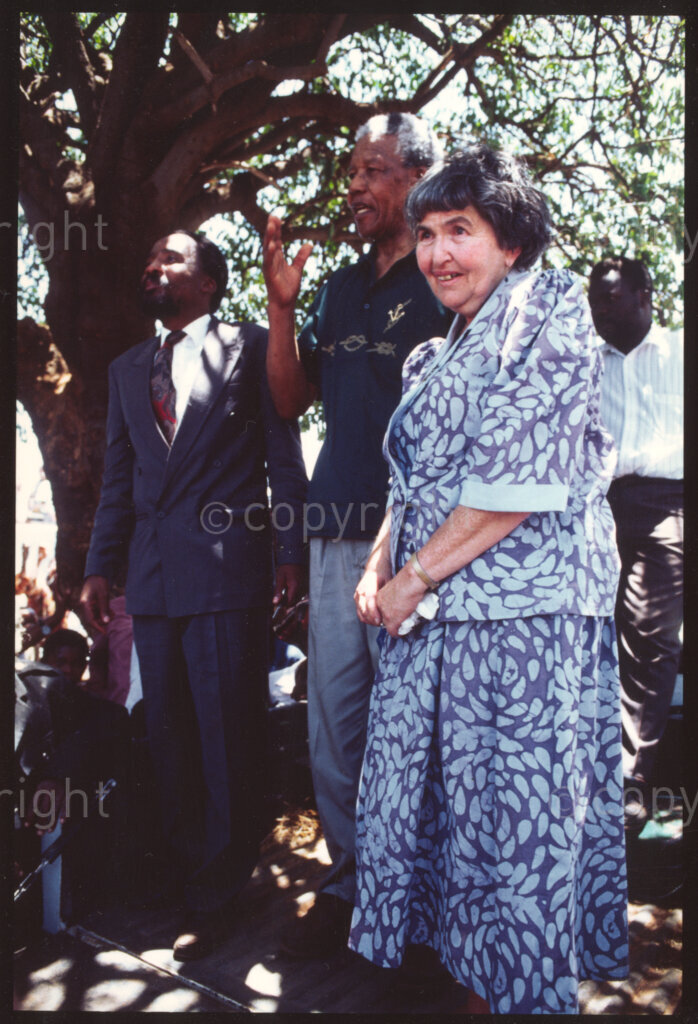 Maila Mapitsa village, Sekhukhuneland, Transvaal, South Africa, 19921130. PHOTO: ANC Archives.

The President of the African National Congress (ANC), Nelson Mandela (left) and Executive Director of Operation Hunger, Ina Perlman (right) visit Maila Mapitsa village, Sekhukhuneland, in November 1992.