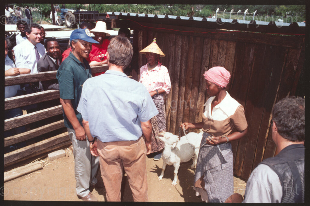 Jane Furse Agricultural Centre, Sekhukhuneland, Transvaal, South Africa, 19921130. PHOTO: ANC Archives.

Operation Hunger Regional Director (for the Northern Transvaal), Johann Rissik (centre), and the African National Congress President, Nelson Mandela (left), attend the christening ceremony of the Jane Furse Agricultural Center, Sekhukhuland in November 1992. The goats sacrificed for the occasion were named Kgotso (Northern Sotho for 'Peace') and Tswelepele (Northern Sotho for 'Progress').