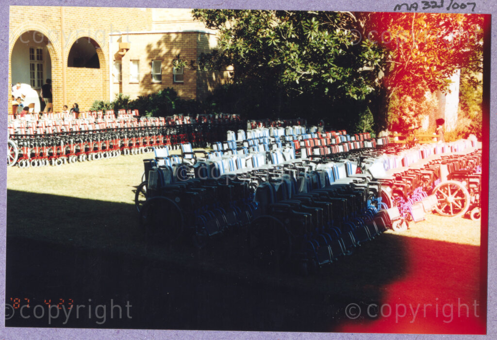 Hilton College, Pietermaritzburg, KwaZulu-Natal, South Africa, 19960717. PHOTO: ANC Archives.

New wheelchairs are arranged in a line awaiting the young recipients who are to be given them on the occasion of the 78th birthday of the President of South Africa, Nelson Mandela, fondly known as Madiba. More than 2,000 children who are living with disability in disadvantaged communities across the county have been invited to the day-long birthday extravaganza being held on the 17th July 1996 on the grounds of Hilton College near Pietermaritzburg in the KwaZulu-Natal Midlands. In advance of today's festivities, the invited children have been examined and treated by a team of orthopaedic specialists and physiotherapists. The event has the backing of the Nelson Mandela Children's Fund. Nelson Mandela was born on the 18th July 1918 in Mvezo, a small village in the Eastern Cape.