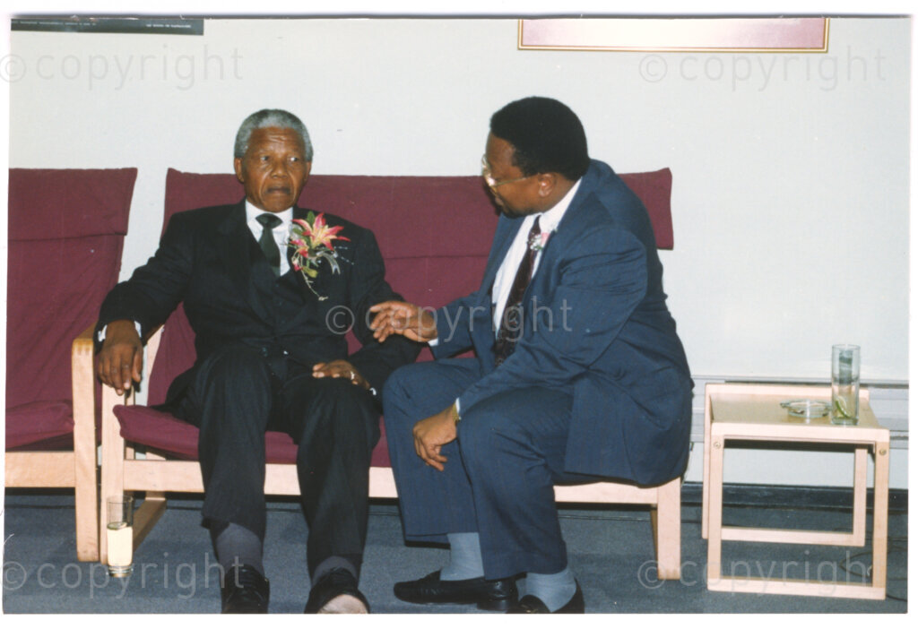 Parktonian Hotel, Johannesburg, Transvaal, South Africa, 19940309. PHOTO: ANC Archives.

The President of the African National Congress (ANC), Nelson Mandela (left), takes a quiet moment with a colleague at an ANC voter education fund-raising dinner hosted by the Taiwanese community in South Africa on the 9 March 1994. Leading up to the 1994 elections in South Africa, Taiwan embarked on a public relations campaign in efforts to improve relations with the ANC, providing financial support to the ANC's election campaign. South Africa's diplomatic ties with Taiwan (The Republic of China) ended in 1998 however when Nelson Mandela, as President of South Africa, recognized the People's Republic of China.