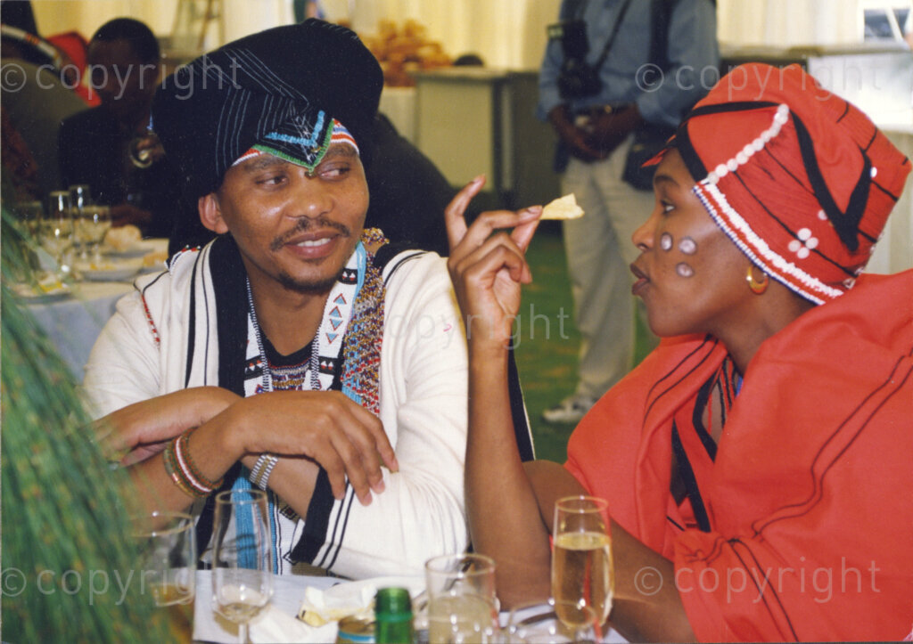 Cape Town, Western Cape, South Africa, 19970418. PHOTO: ANC Archives.

Two women in traditional Xhosa dress at the inauguration of the National Council of Traditional Leaders, Cape Town, Western Cape, South Africa on 18 April 1997.