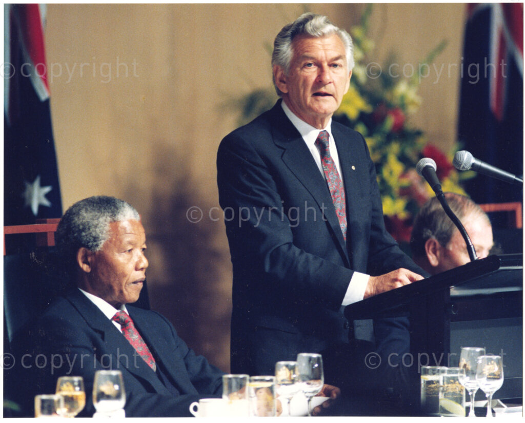 Australia, October 1990. PHOTO: ANC Archives: Australian Prime Minister Bob Hawke responds to Nelson Mandela's address during Mandela's 1990 visit to that country. Mandela expresses his thanks to the host country for their ongoing loyal support of himself and the ANC. Regrettably, during this visit, Mandela makes no reference to the plight of the Aborigines. This draws severe criticism from Australian human rights activisits such as Michael Mansell and Dr Gary Foley. Monday 22 October to Saturday 27 October 1990.