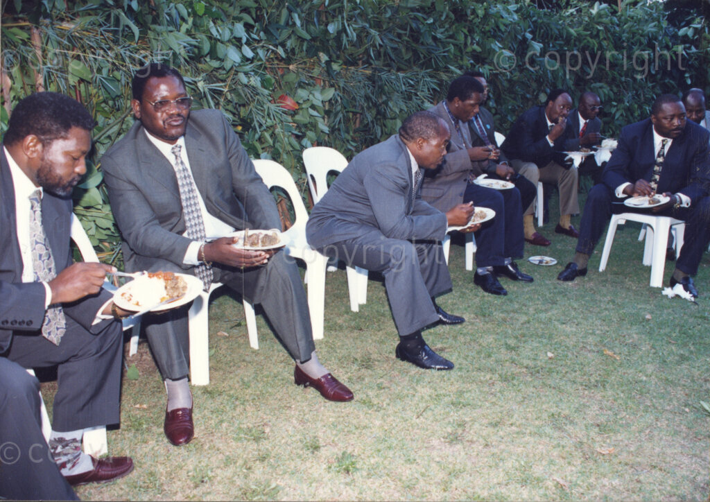 Cape Town, Western Cape, South Africa, 19970418. PHOTO: ANC Archives.

Khosi D.E. Mulaudzi, second left, with a group of seated men having something to eat at the inauguration of the National Council of Traditional Leaders in Cape Town, Western Cape, South Africa on 18 April 1997.