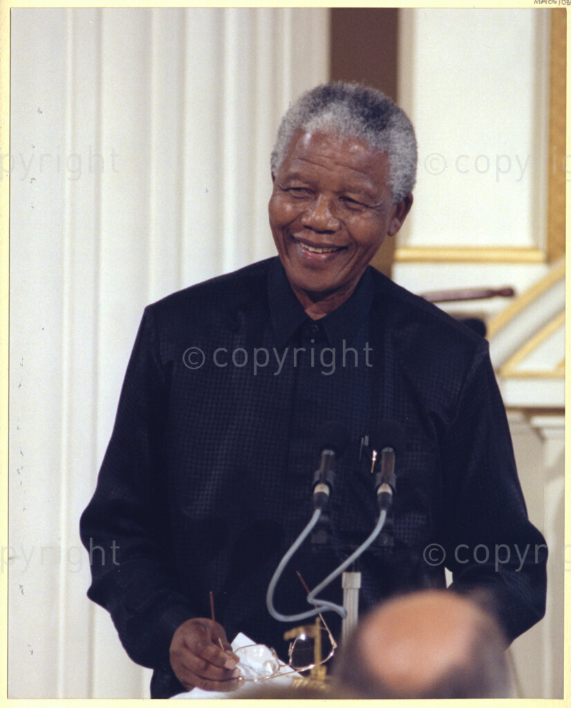 London, United Kingdom, 19960701. PHOTO: ANC Archives: In July 1996, South African President Nelson Mandela is seen making an address during a state visit to the United Kingdom. His reception in this country is jubilant. This appears to be reflected in the happiness he exudes in this portrait.