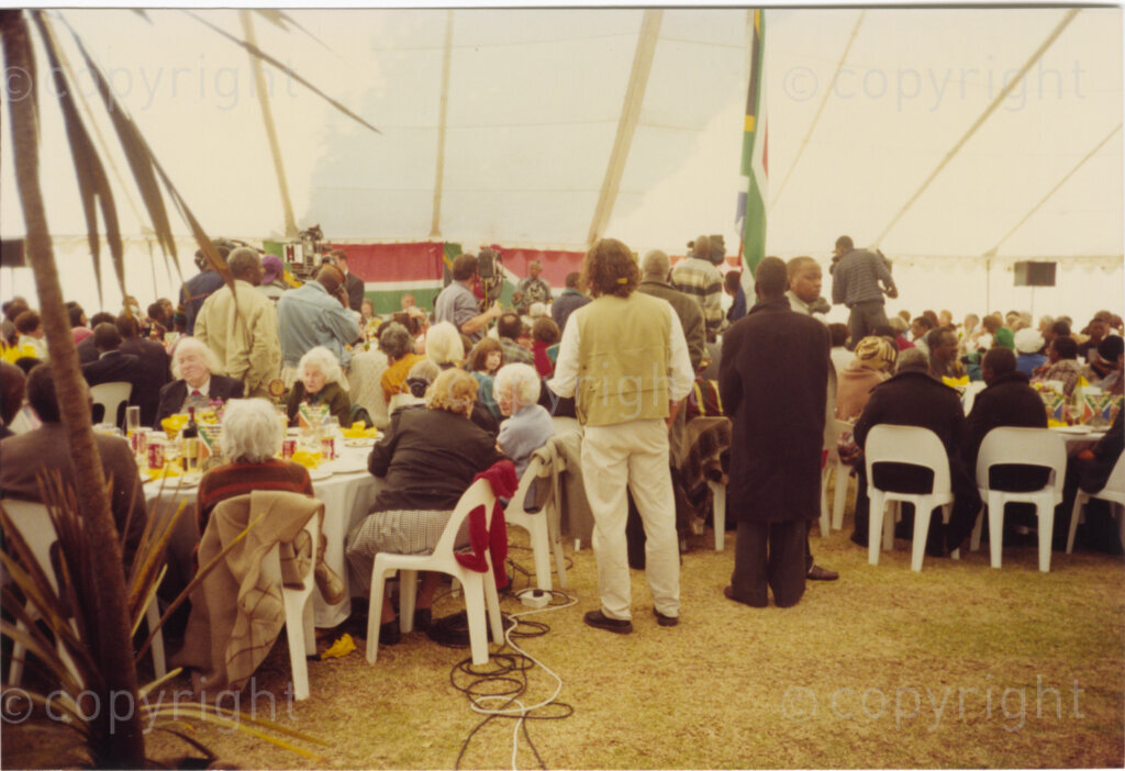 Johannesburg, Gauteng, South Africa, 19960719. PHOTO: Pan African Archives.

In July 1996, five different celebrations are held to mark President Mandela's 78th birthday. A jovial mood prevails at this party in which veterans of the African National Congress struggle are honoured. It is always President Mandela's desire to remember and include other people and to focus on their achievements and contributions to democracy.
