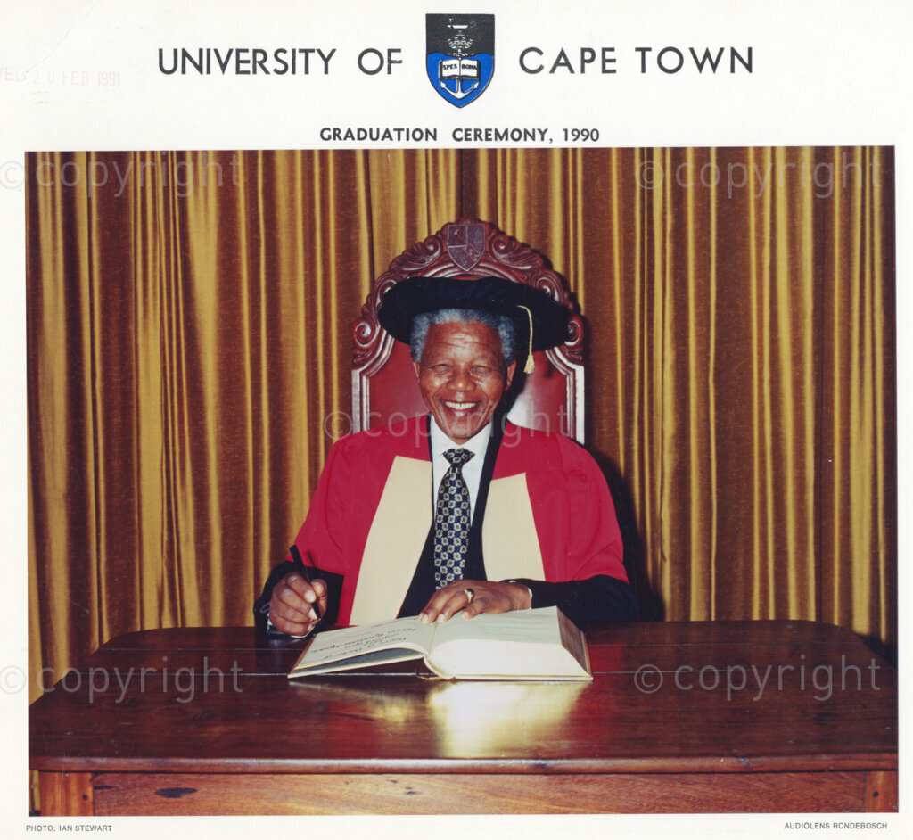 University of Cape Town, Cape Town, Cape Province, Republic of South Africa, 19901130. PHOTO: ANC Archives.

Nelson Mandela, the deputy president of the African National Congress (ANC), signs a register before he is awarded an honorary doctorate in law by the University of Cape Town, the Republic of South Africa, 30 November 1990.