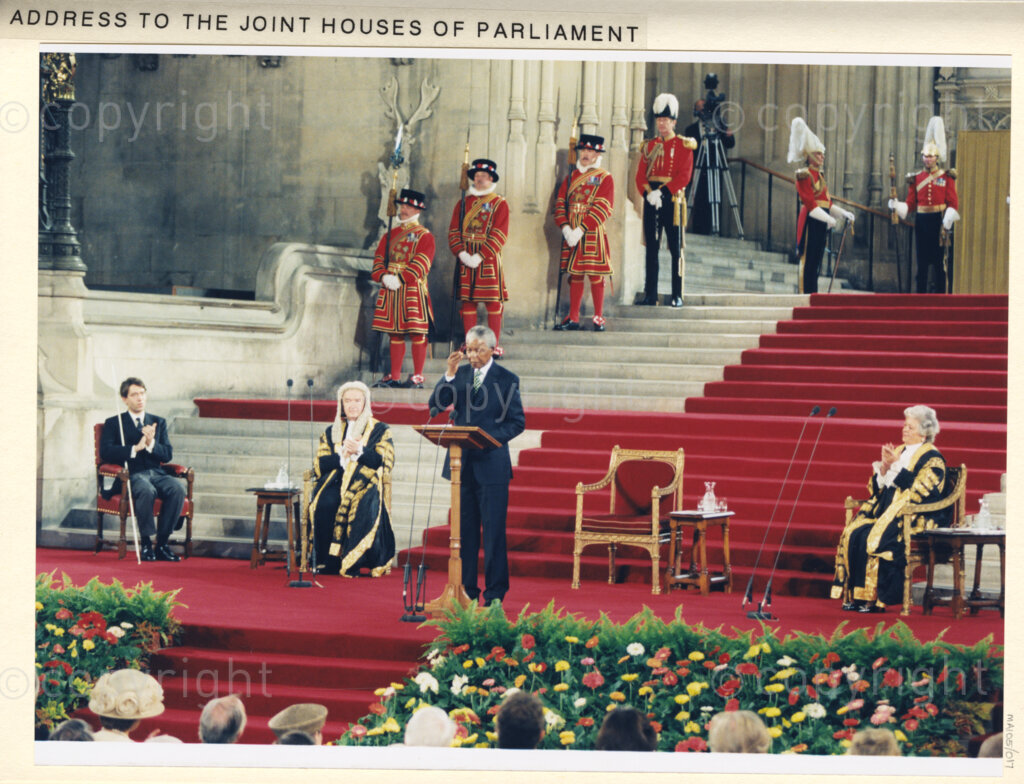 Westminster Hall, Houses of Parliament, London, United Kingdom, 19960701. PHOTO: ANC Archives: On his state visit to the United Kingdom in July 1996, President Nelson Mandela addresses the Joint Houses of Parliament in Westminster Hall. He is courteous, yet forthright, saying that while he has forgiven those who did wrong in the past, he will never forget. It is noted that the African National Congress, in seeking help from the British democracy, were turned away by former Prime Minister, Margaret Thatcher.