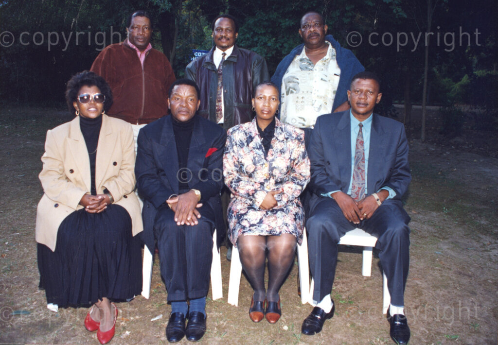 Cape Town, Western Cape, South Africa, 19970418. PHOTO: ANC Archives.

A group portrait of traditional leaders including Kgosi Victor S. Suping (seated second left), Kgosi S.S. Montshisa (seated right), Hosi M.L. Nkuna (standing left), and Kgosi Mokalake Bennet Motsatsi (standing right) at the inauguration of the National Council of Traditional Leaders in Cape Town, Western Cape, South Africa on 18 April 1997.