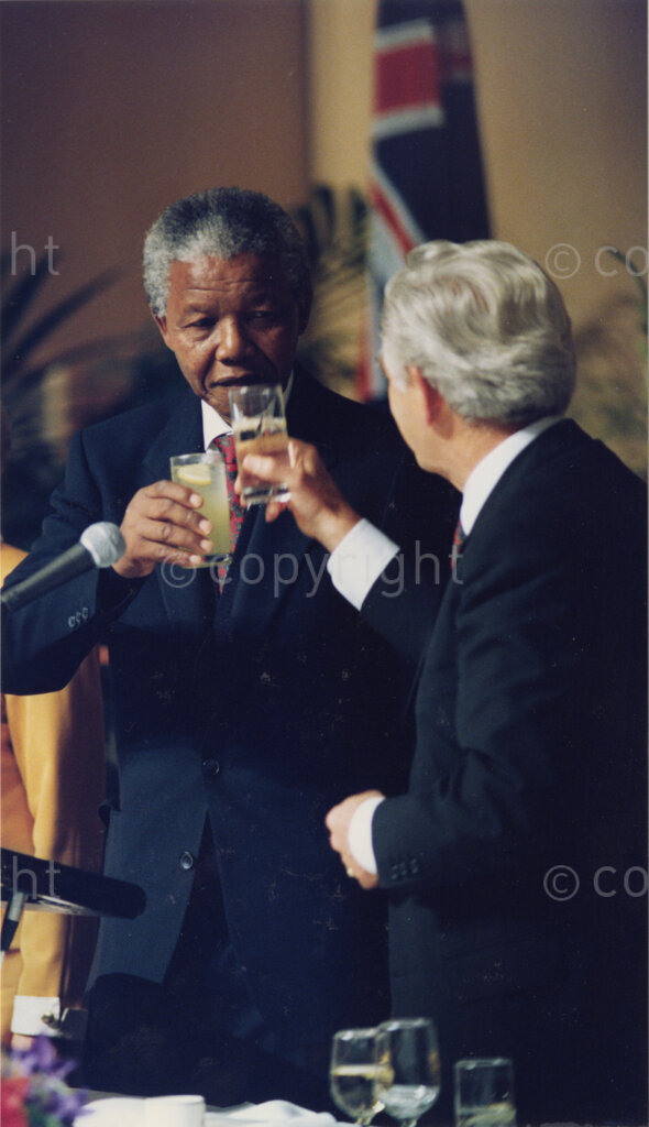 Australia, October 1990. PHOTO: ANC Archives: During his first visit to Australia in 1990, Nelson Mandela, Deputy President of the African National Congress, toasts Gareth Evans, a dedicated Australian human rights activist. Despite this, the Aborigines feel left out of Nelson Mandela's time in Australia. Monday 22 October to Saturday 27 October 1990.