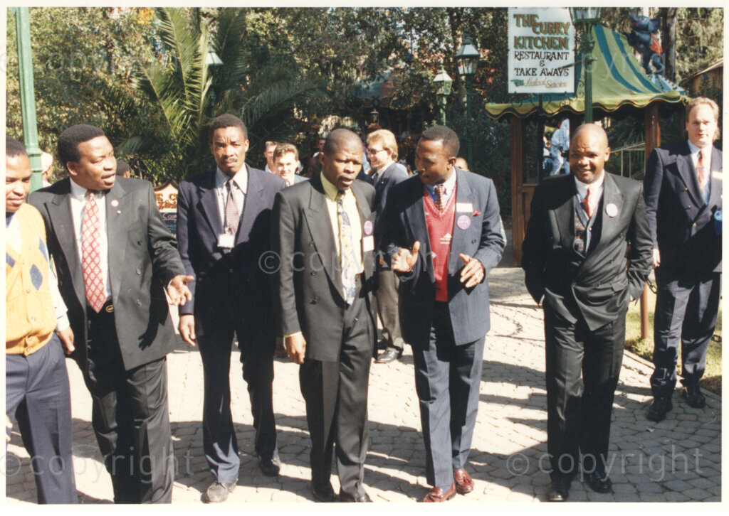 Gold Reef City, Johannesburg, Gauteng, South Africa, 19950717. PHOTO: ANC Archives.

A number of dignitaries, join the President of South Africa, Nelson Mandela, as he celebrates his 77th birthday with underprivileged children at Gold Reef City, Johannesburg, on Monday the 17th July 1995. More than 2,000 children, including 34 children who are currently imprisoned, street children, children from orphanages, mentally disabled children and children who have been abused, have been invited to attend his birthday celebration with him. Madiba is attending this function in his personal capacity as he places special emphasis on the plight of children. Nelson Mandela was born on the 18th July 1918 in Mvezo, a small village in the Eastern Cape.