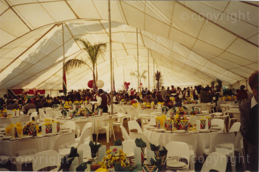 Johannesburg, Gauteng, South Africa, 19960719. PHOTO: Pan African Archives.

In July 1996, five different party celebrations are held to mark President Mandela's 78th birthday. A jovial mood prevails at this party in which veterans of the African National Congress struggle are honoured. It is always President Mandela's desire to remember and include other people and to focus on their achievements and contributions to democracy.