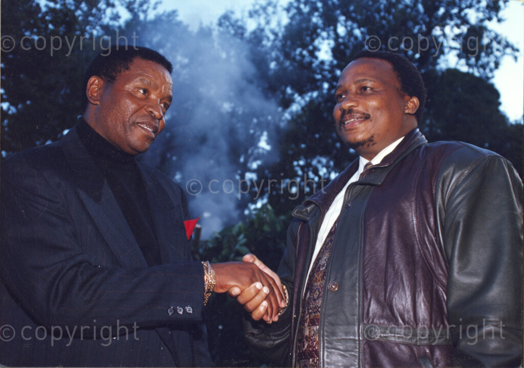 Cape Town, Western Cape, South Africa, 19970418. PHOTO: ANC Archives.

Kgosi S. Victor Suping (right) from the North West Province shakes the hand of an unidentified man at the social function following the inauguration of the National Council of Traditional Leaders in Cape Town, Western Cape, South Africa on 18 April 1997.