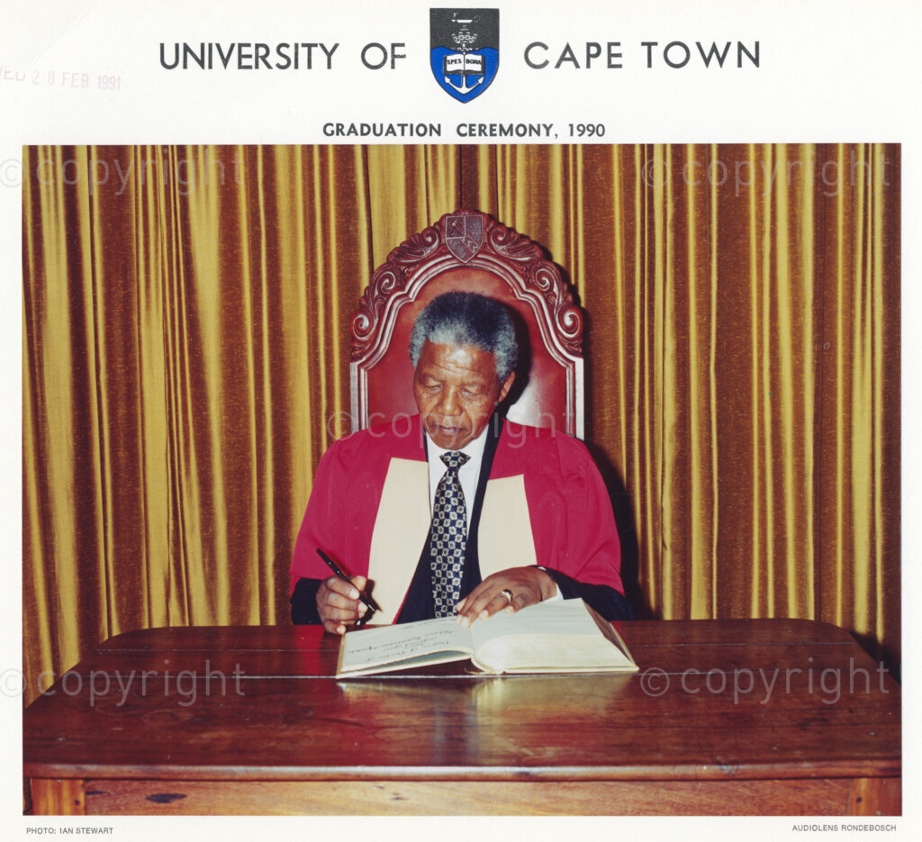 University of Cape Town, Cape Town, Cape Province, Republic of South Africa, 19901130. PHOTO: ANC Archives.

Nelson Mandela, the deputy president of the African National Congress (ANC), signs a register before he is awarded an honorary doctorate in law by the University of Cape Town, the Republic of South Africa, 30 November 1990.