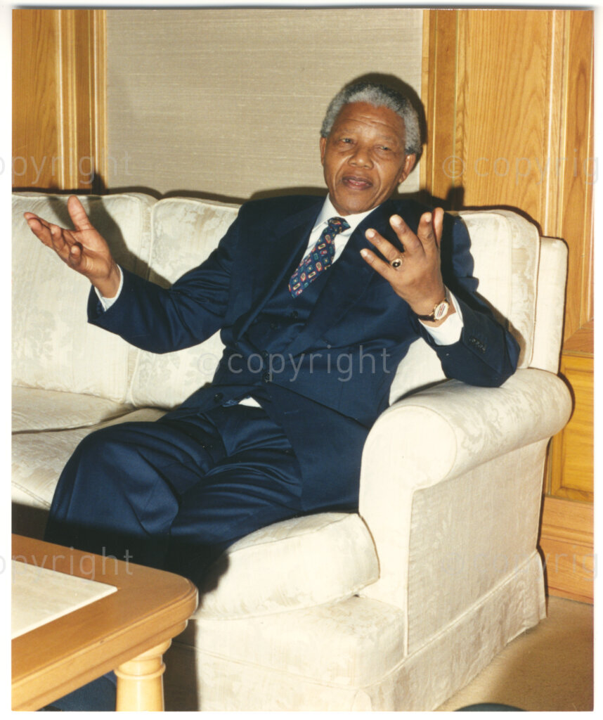 South Africa, 19940805. PHOTO: ANC Archives.

President Nelson Mandela of South Africa gestures in conversation during the presentation of R50 000 which is made by the Bona People's Fund towards his foundation, the Nelson Mandela Children's Fund on 5 August 1994.